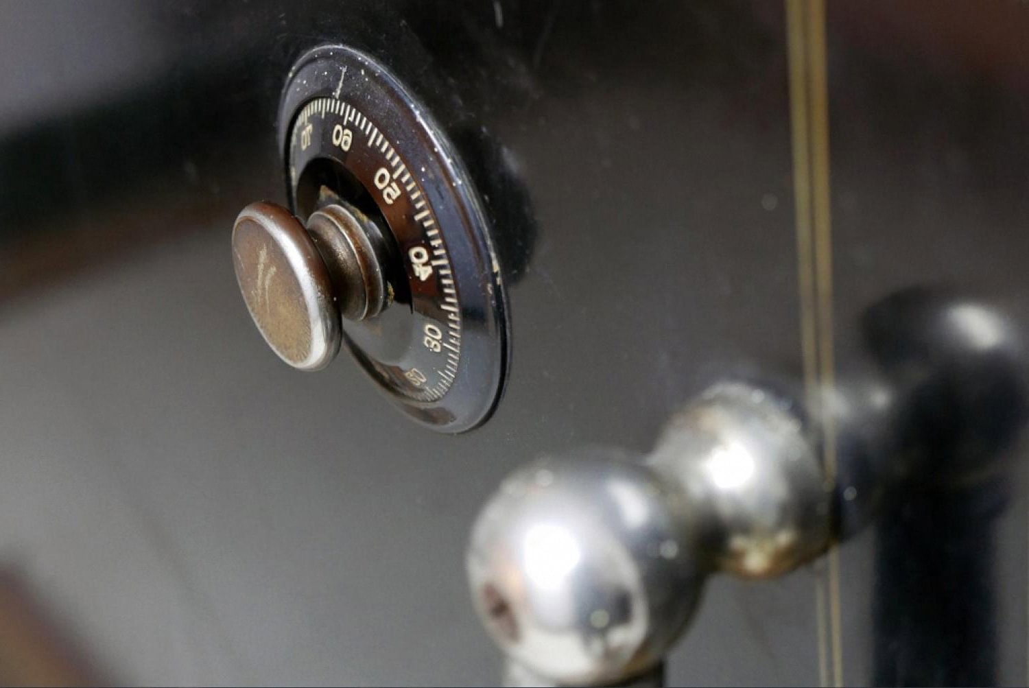 Close-up of a mechanical combination dial on a luxury home safe